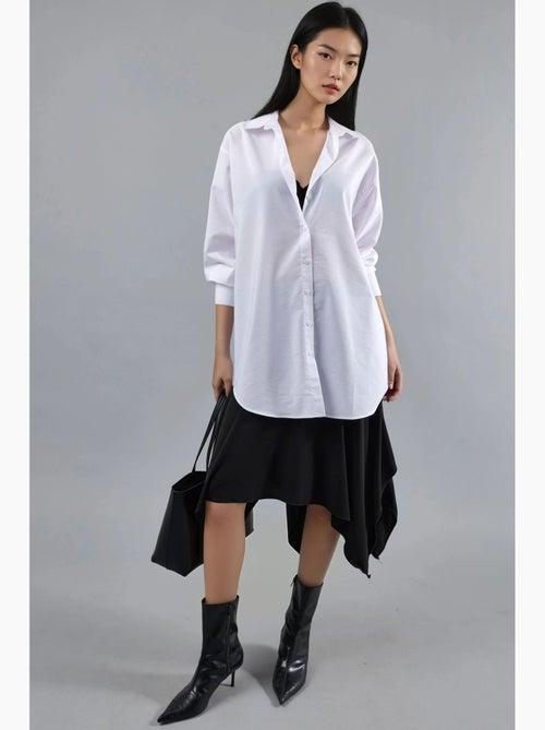 Camisa de popelina con botones y mangas largas busem - Kiabi Camisa de popelina con botones y mangas largas busem - Kiabi