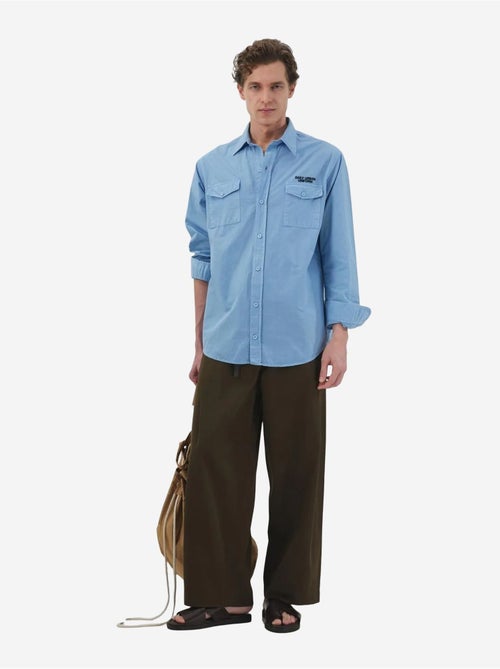 Camisa de popelina de algodón con estampado de texto para hombre giesto - Kiabi Camisa de popelina de algodón con estampado de texto para hombre giesto - Kiabi