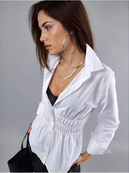 Camisa de popelina de manga larga con botones busem - Kiabi Camisa de popelina de manga larga con botones busem - Kiabi