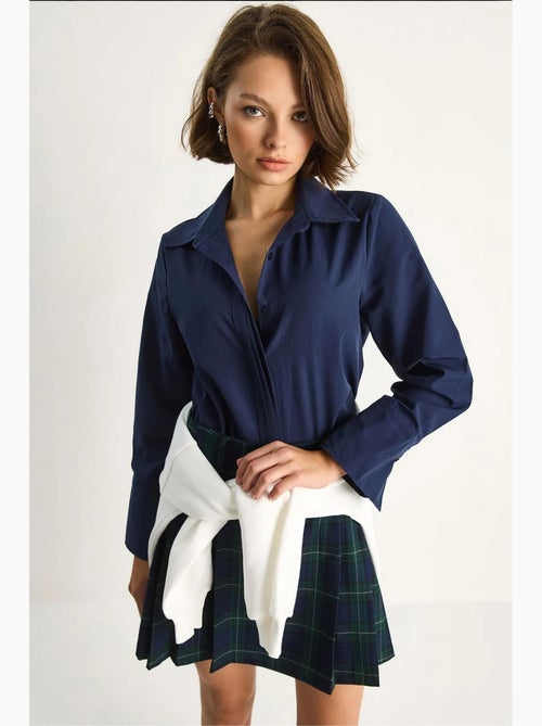 Camisa de popelina de manga larga con botones y corte regular de lucci - Kiabi Camisa de popelina de manga larga con botones y corte regular de lucci - Kiabi