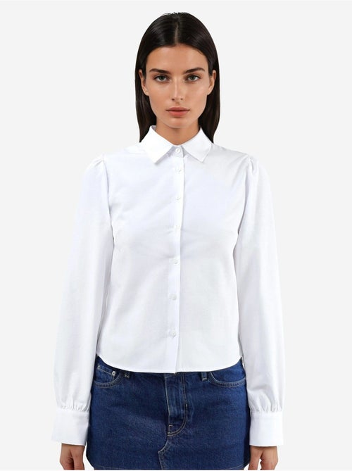 Camisa de popelina lisa con cierre de botones busem - Kiabi Camisa de popelina lisa con cierre de botones busem - Kiabi