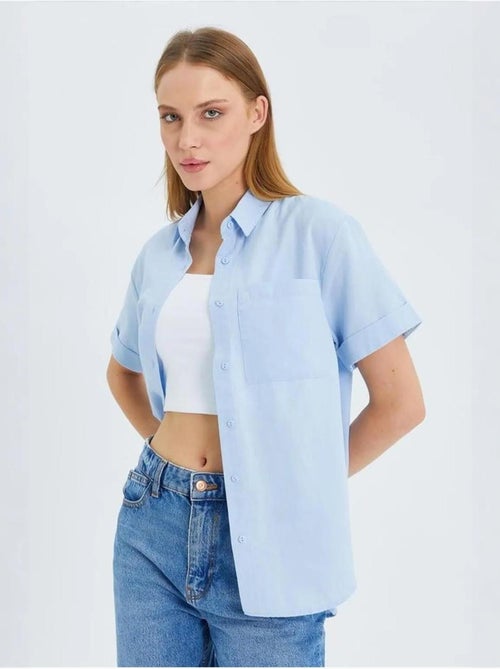 Camisa de popelina slim fit con bolsillo mixray - Kiabi Camisa de popelina slim fit con bolsillo mixray - Kiabi
