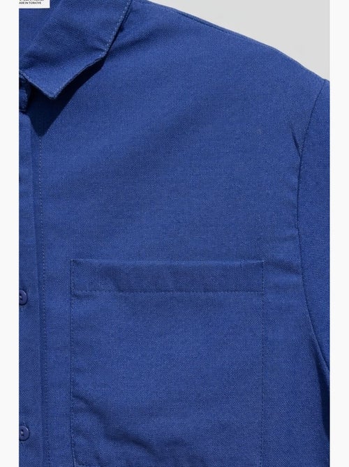 Camisa de popelina slim fit con bolsillo mixray - Kiabi Camisa de popelina slim fit con bolsillo mixray - Kiabi