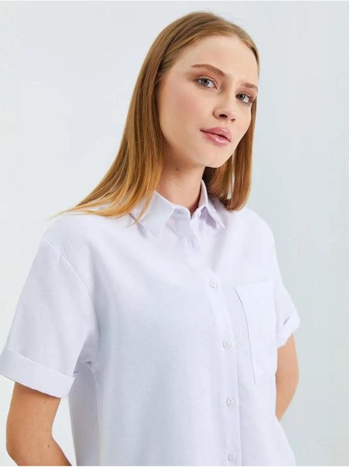 Camisa de popelina slim fit con bolsillo mixray - Kiabi Camisa de popelina slim fit con bolsillo mixray - Kiabi
