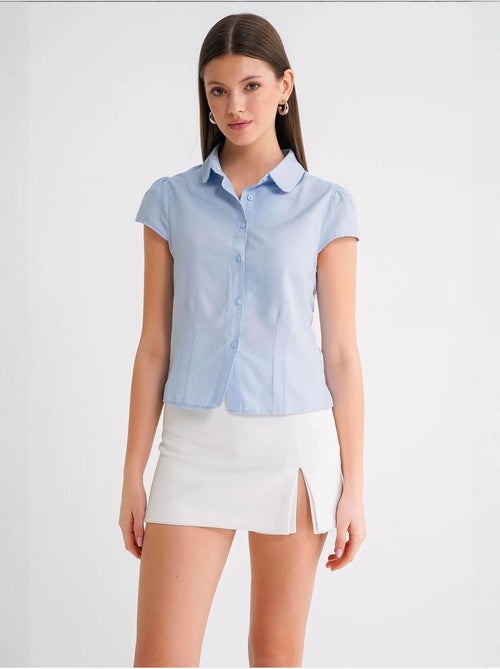 Camisa de popelina slim fit con cierre de botones mixray - Kiabi Camisa de popelina slim fit con cierre de botones mixray - Kiabi