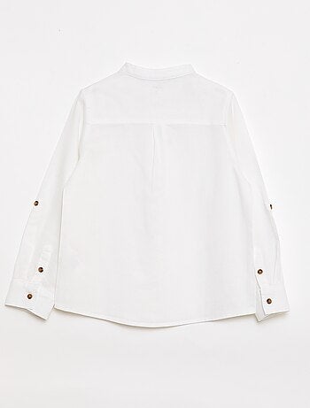 Camisa de rayas con mangas remangables