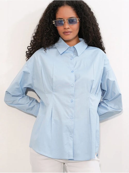 Camisa entallada de popelina con cierre de botones frontal bdart - Kiabi Camisa entallada de popelina con cierre de botones frontal bdart - Kiabi