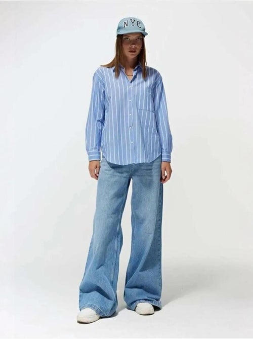 Camisa extragrande a rayas con botones y bolsillo mixray - Kiabi Camisa extragrande a rayas con botones y bolsillo mixray - Kiabi