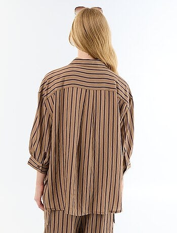 Camisa fluida de rayas con mangas abullonadas