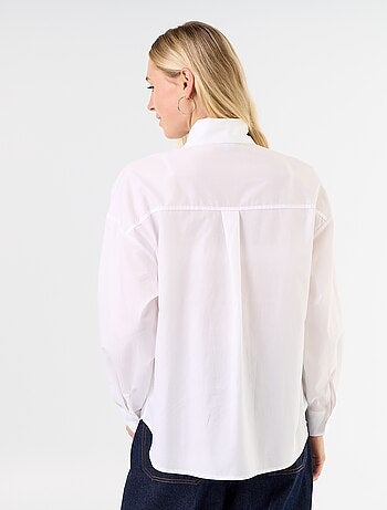 Camisa holgada de manga larga y cuello anudado