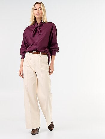 Camisa holgada de manga larga y cuello anudado