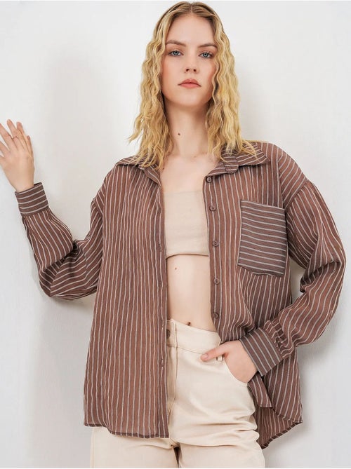 Camisa oversize a rayas con cierre de botones delantero bdart - Kiabi Camisa oversize a rayas con cierre de botones delantero bdart - Kiabi
