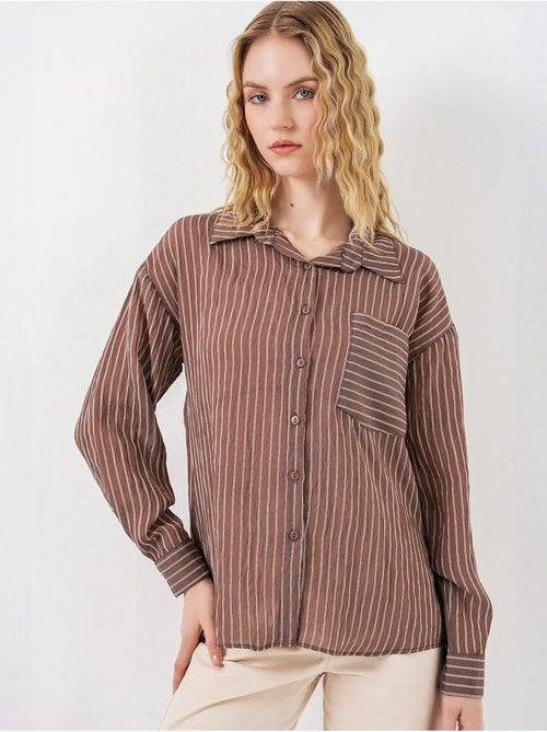 Camisa oversize a rayas con cierre de botones delantero bdart - Kiabi Camisa oversize a rayas con cierre de botones delantero bdart - Kiabi