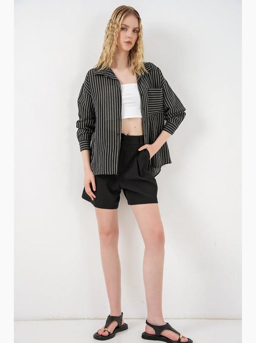 Camisa oversize a rayas con cierre de botones delantero bdart - Kiabi Camisa oversize a rayas con cierre de botones delantero bdart - Kiabi