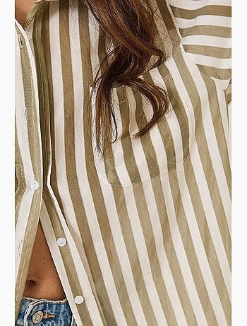 Camisa oversize con detalle de bolsillo único a rayas lucci