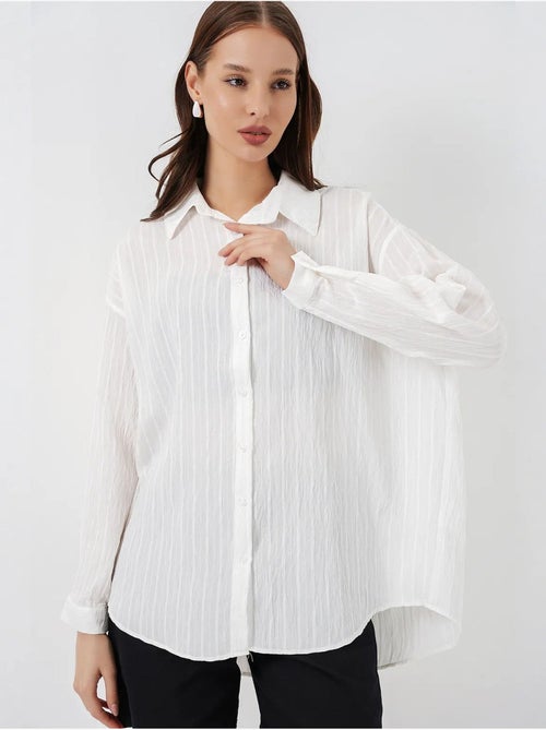 Camisa oversize texturizada de rayas con cierre de botones bdart - Kiabi Camisa oversize texturizada de rayas con cierre de botones bdart - Kiabi
