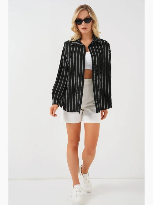 Camisa oversize texturizada de rayas con cierre de botones bdart - Kiabi Camisa oversize texturizada de rayas con cierre de botones bdart - Kiabi
