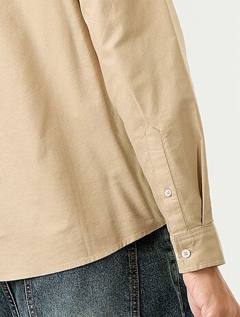Camisa oxford con abertura abotonada