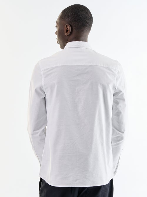 Camisa oxford con abertura abotonada - Kiabi Camisa oxford con abertura abotonada - Kiabi
