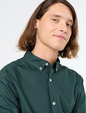 Camisa oxford con abertura abotonada