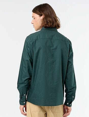Camisa oxford con abertura abotonada