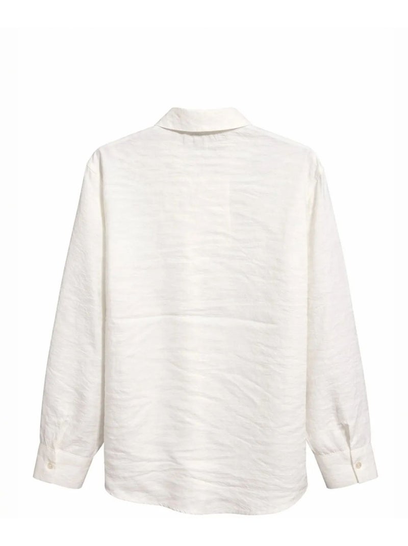 Camisa relajada con botones y bolsillo mixray Marfil - Kiabi