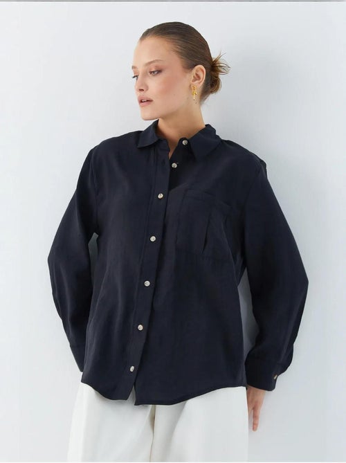 Camisa relajada con botones y bolsillo mixray - Kiabi Camisa relajada con botones y bolsillo mixray - Kiabi
