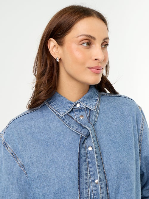 Camisa vaquera con cuello camisero con lazada - Kiabi Camisa vaquera con cuello camisero con lazada - Kiabi
