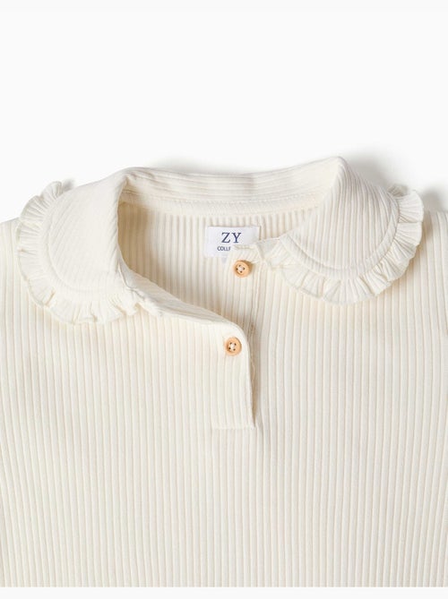 Camiseta acanalada de manga larga con cuello con volantes - Kiabi Camiseta acanalada de manga larga con cuello con volantes - Kiabi