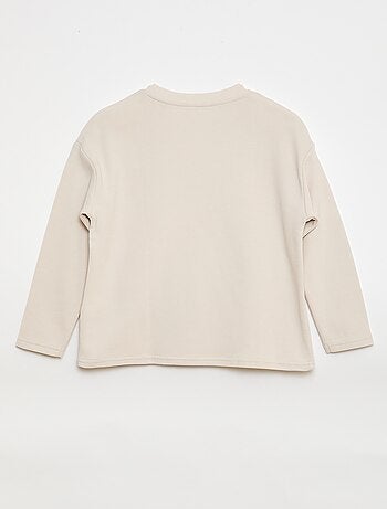 Camiseta con bolsillo canguro en malla otomana