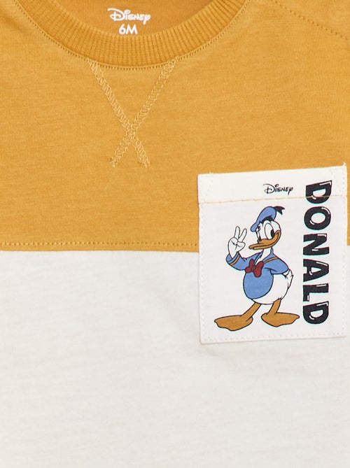 Camiseta con bolsillo en el pecho 'Disney' - Kiabi