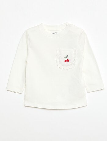 Camiseta con bolsillo fantasía