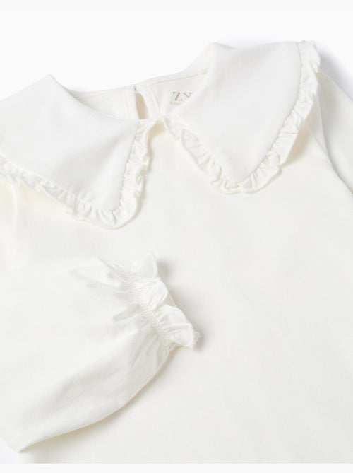 Camiseta con cuello maxi y contorno de volante - Kiabi Camiseta con cuello maxi y contorno de volante - Kiabi