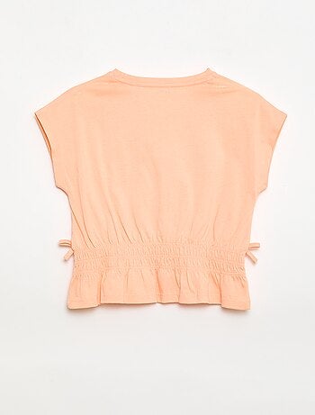 Camiseta con detalle fruncido y lazos en la cintura
