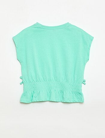 Camiseta con detalle fruncido y lazos en la cintura