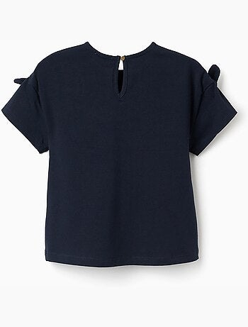 Camiseta con estampado y nudos decorativos