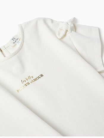 Camiseta con estampado y nudos decorativos