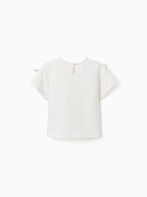 Camiseta con estampado y nudos decorativos - Kiabi Camiseta con estampado y nudos decorativos - Kiabi