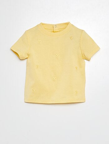 Camiseta con motivos bordados