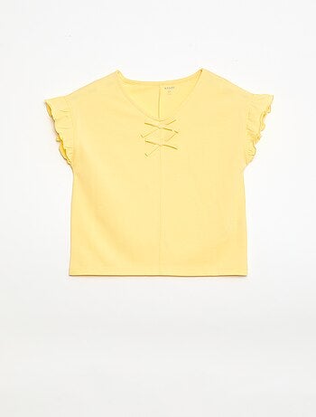 Camiseta con nudos decorativos