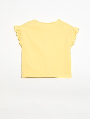 Camiseta con nudos decorativos