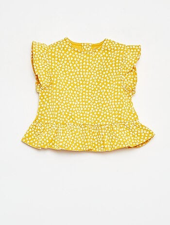 Camiseta con volantes y estampado