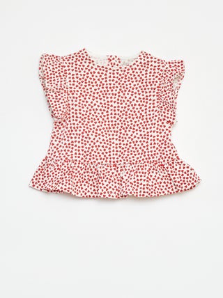 Camiseta con volantes y estampado