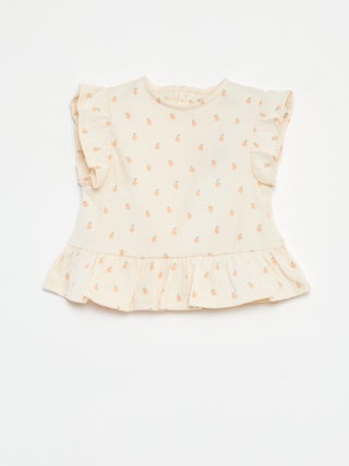 Camiseta con volantes y estampado