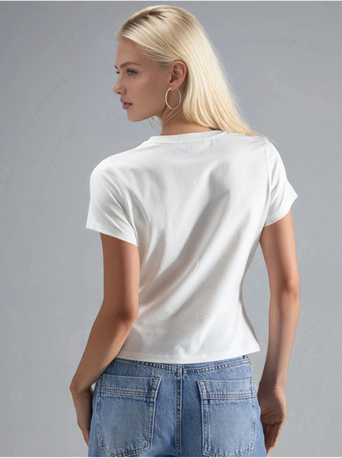 Camiseta corta con cuello redondo estampada hiccup - Kiabi Camiseta corta con cuello redondo estampada hiccup - Kiabi
