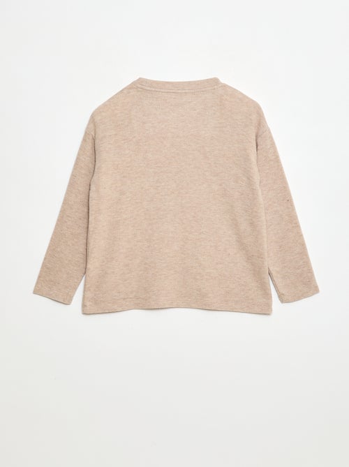 Camiseta corte holgado con diseño en el pecho - Kiabi