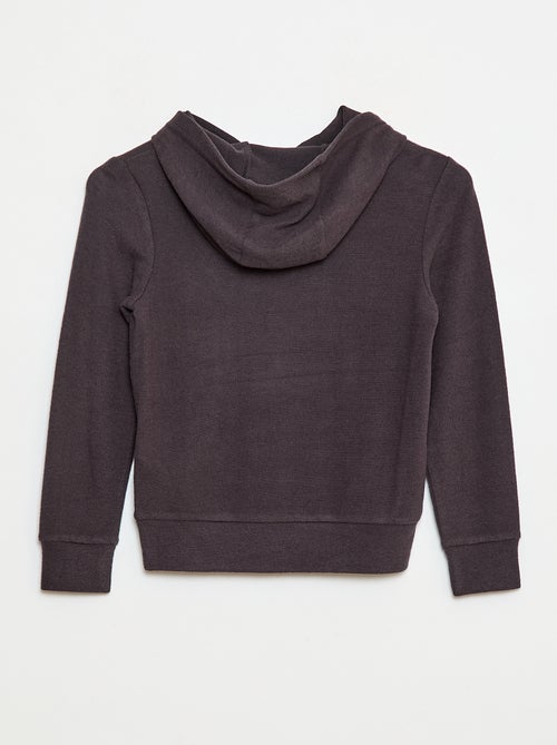 Camiseta cuello con capucha y bolsillo con volante liso - Kiabi