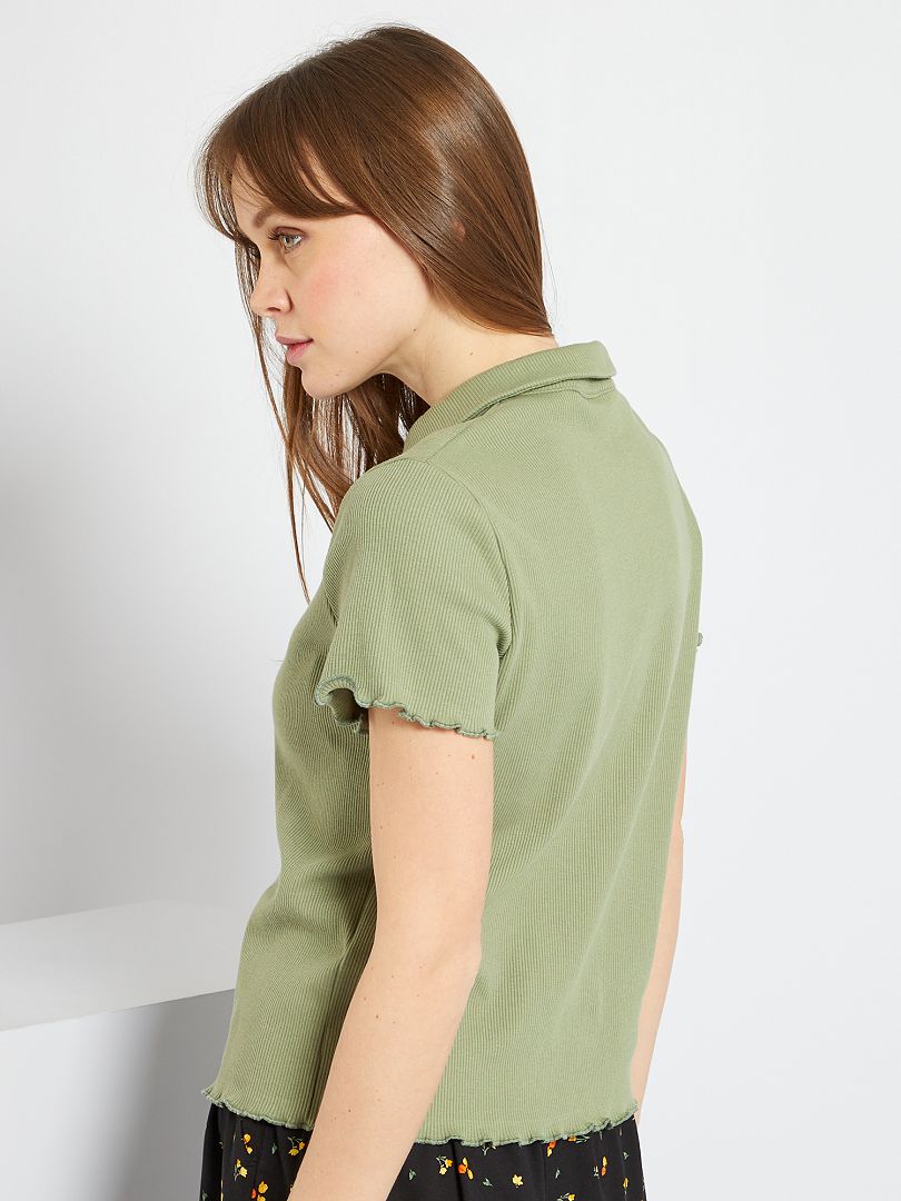 Camiseta cuello polo verde caqui Kiabi 12.00€