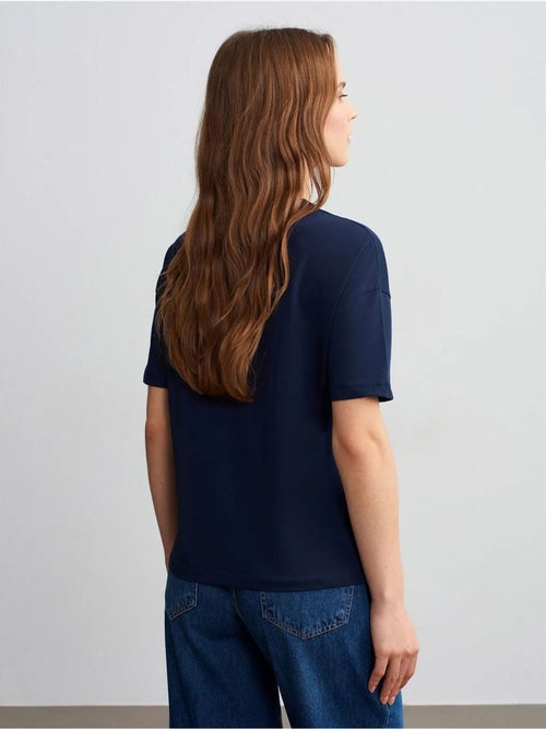 Camiseta de algodón de mujer con cuello redondo dilvin - Kiabi Camiseta de algodón de mujer con cuello redondo dilvin - Kiabi