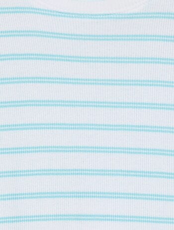 Camiseta de canalé con bordes ondulados y estampados